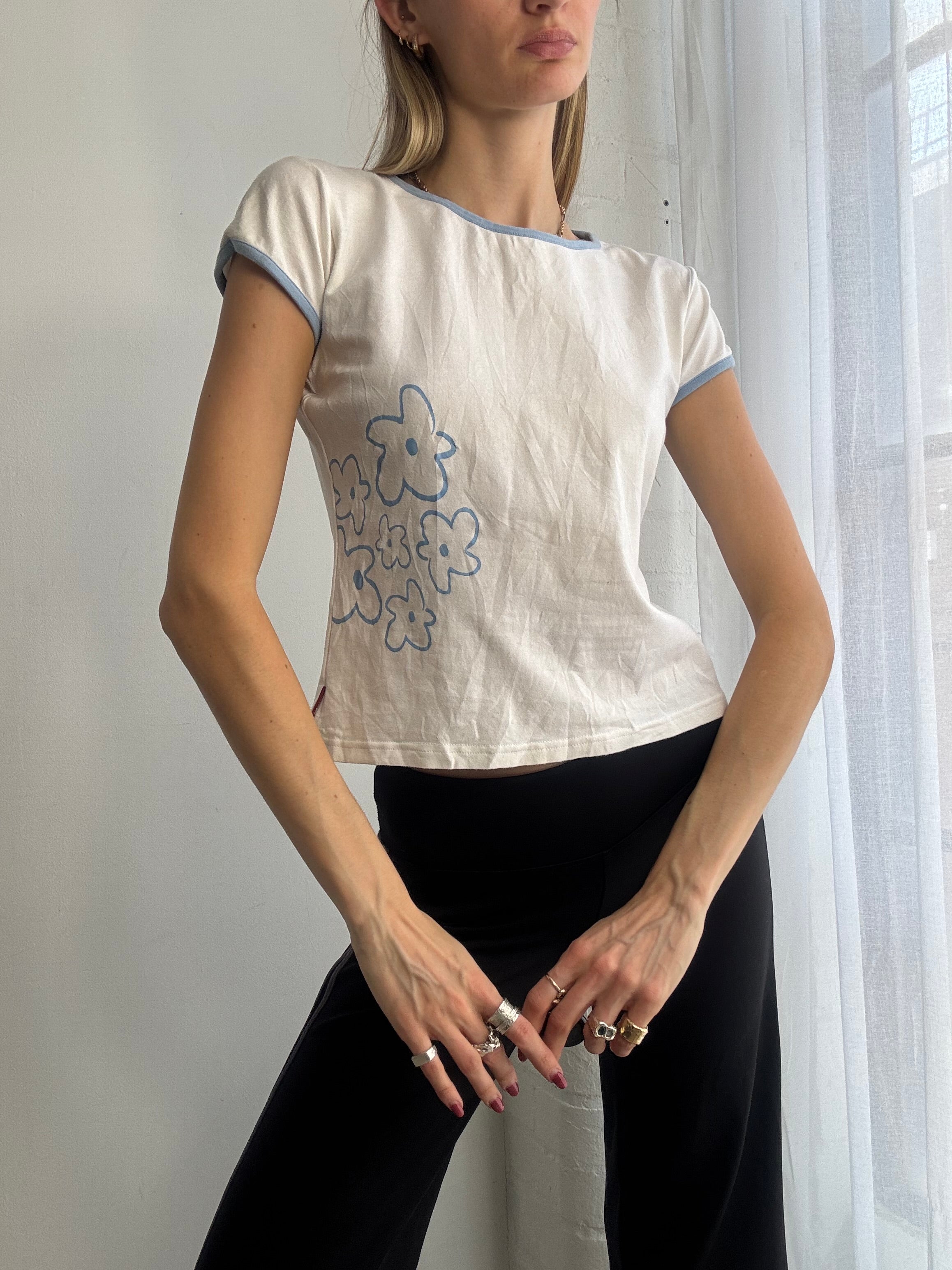 Vintage Y2K white baby tee with blue flower detail