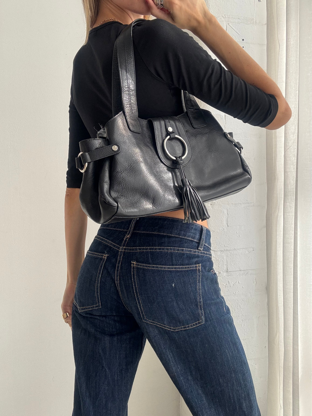 Vintage Y2K Black Leather Shoulder Bag with O-Ring Detail & Tassel
