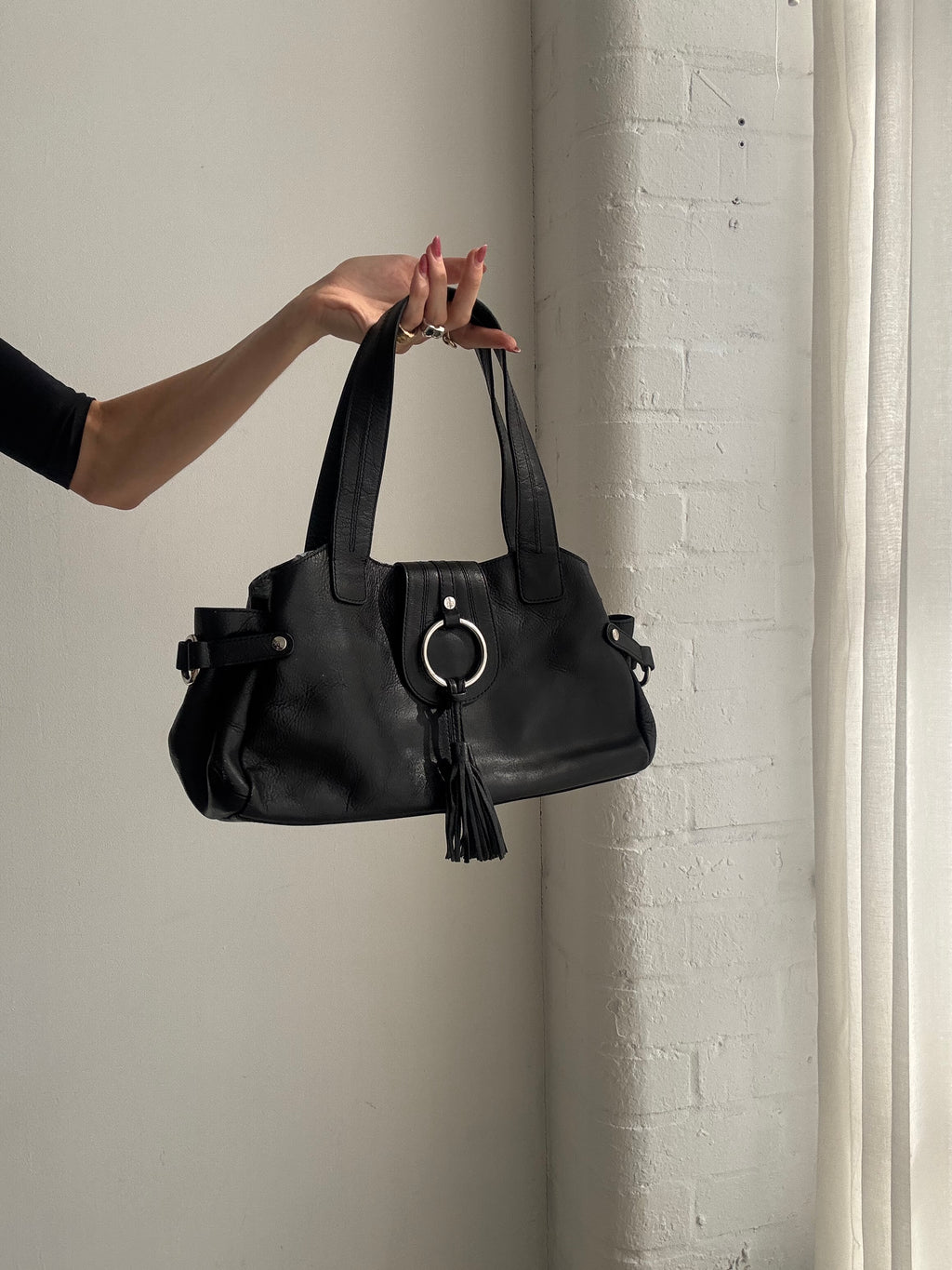 Vintage Y2K Black Leather Shoulder Bag with O-Ring Detail & Tassel