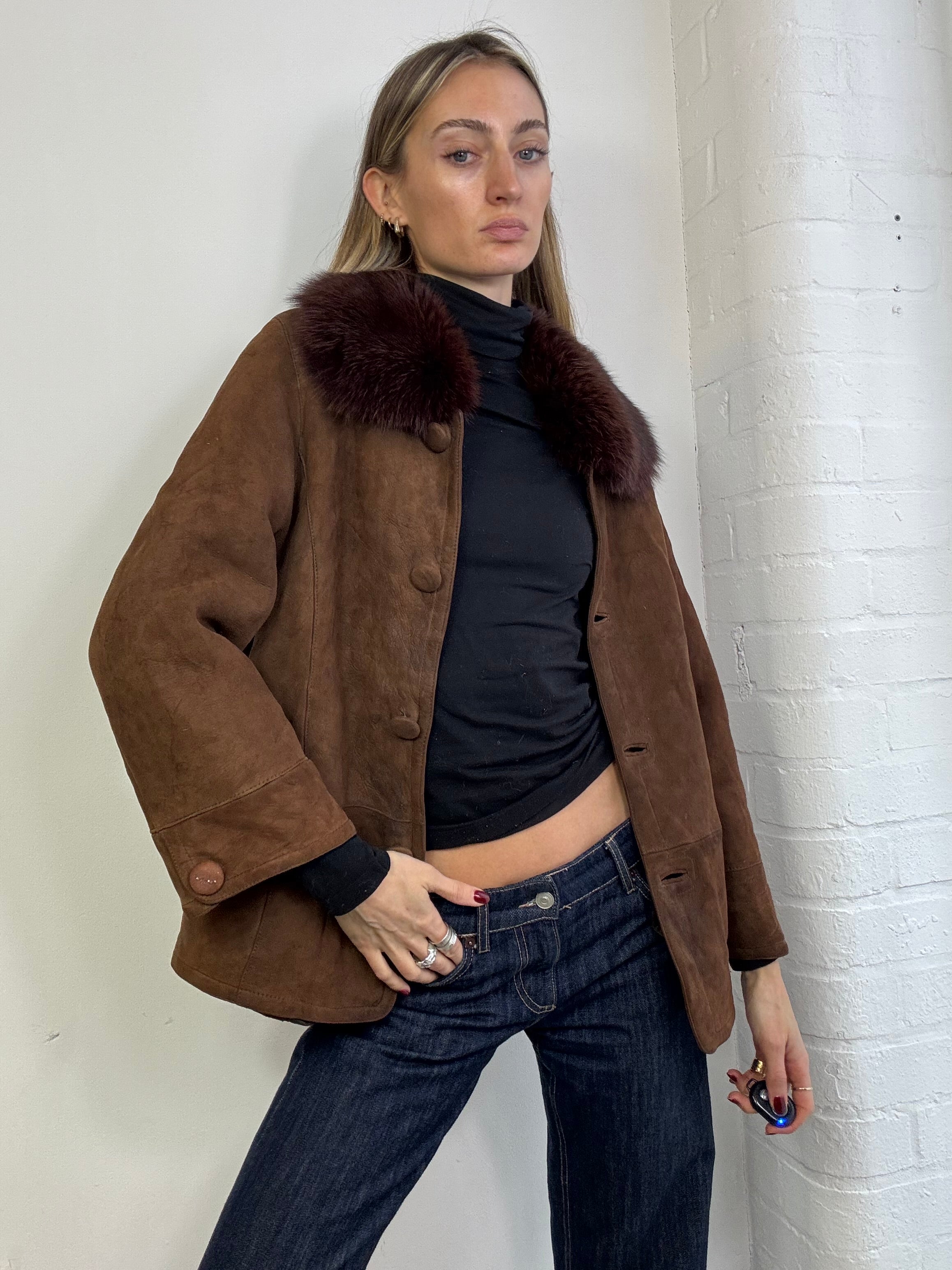Vintage sheepskin coat with fox fur trim