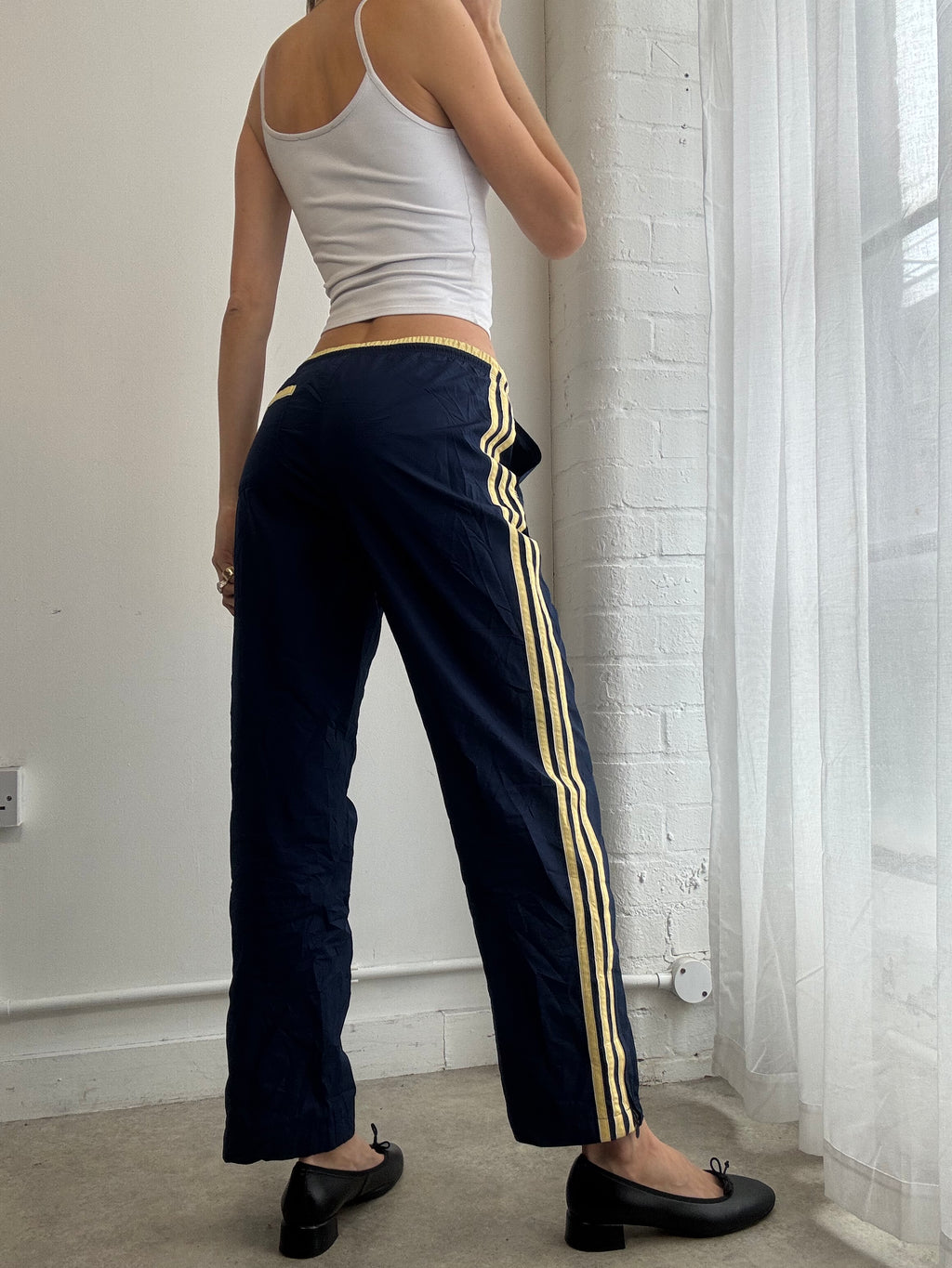 Vintage Y2K navy & yellow Adidas track trousers with side stripe
