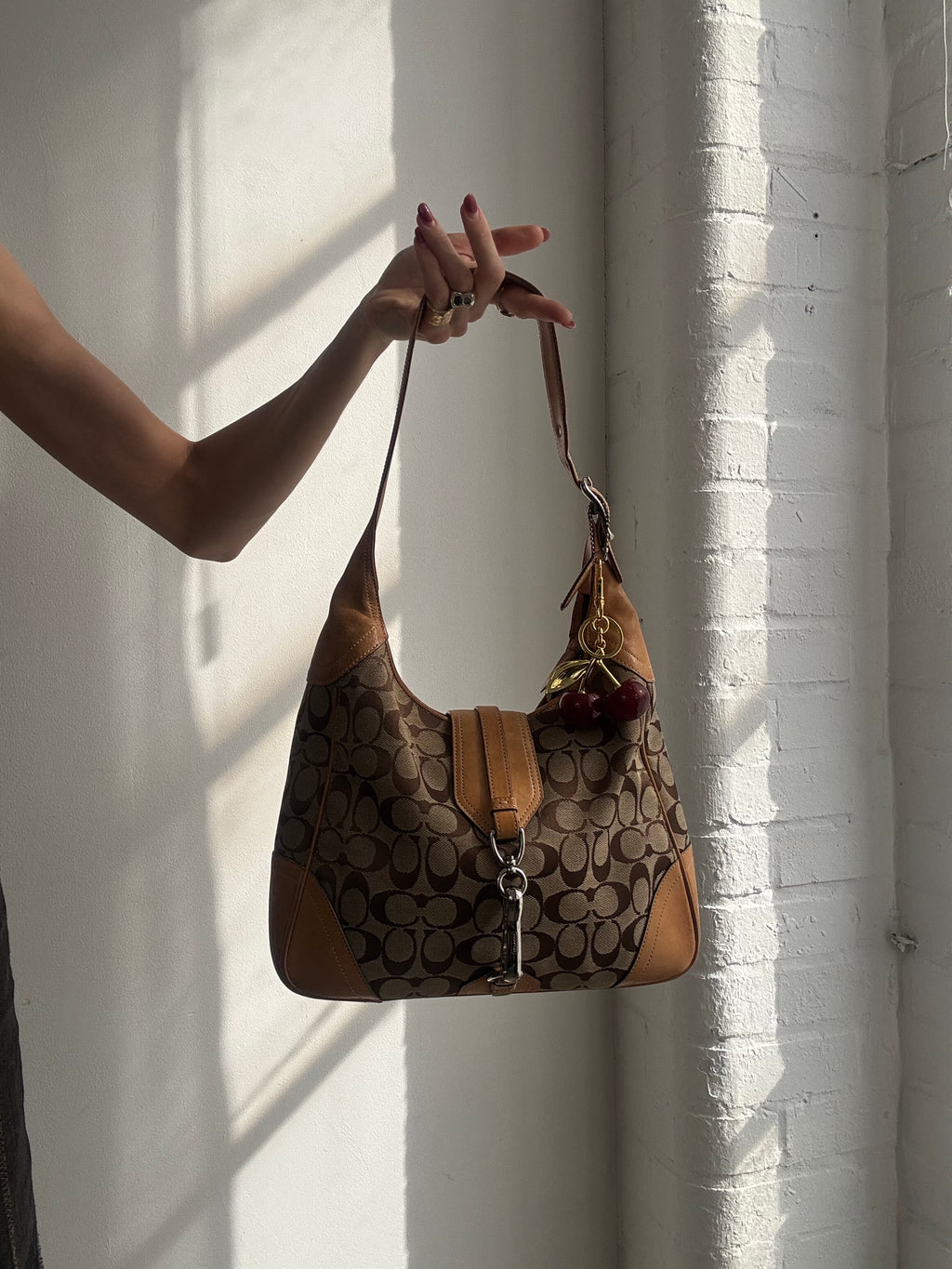 Vintage Y2K Coach monogram shoulder bag with charm