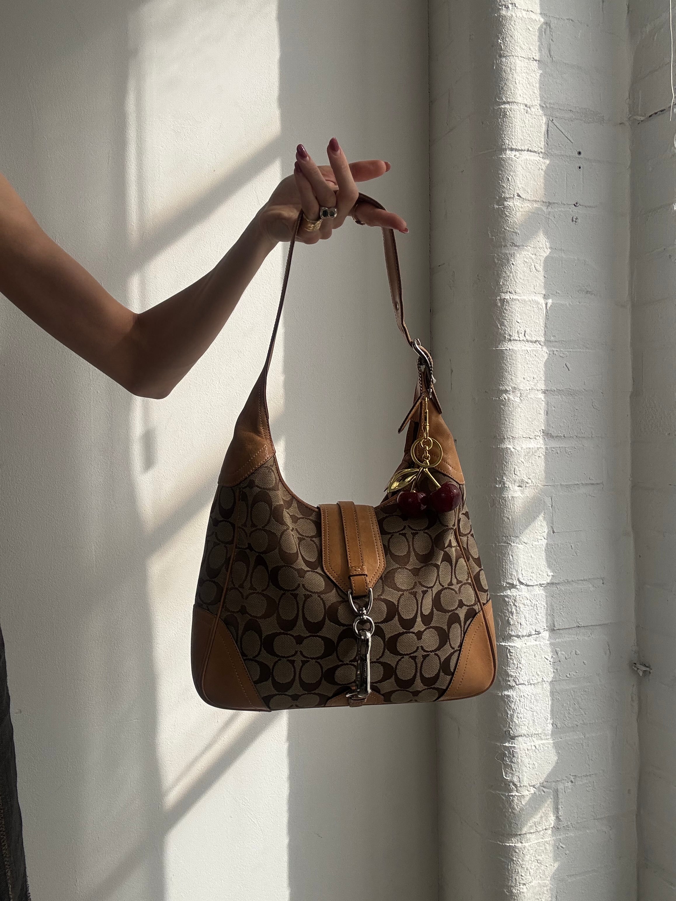 Vintage Y2K Coach monogram shoulder bag with charm