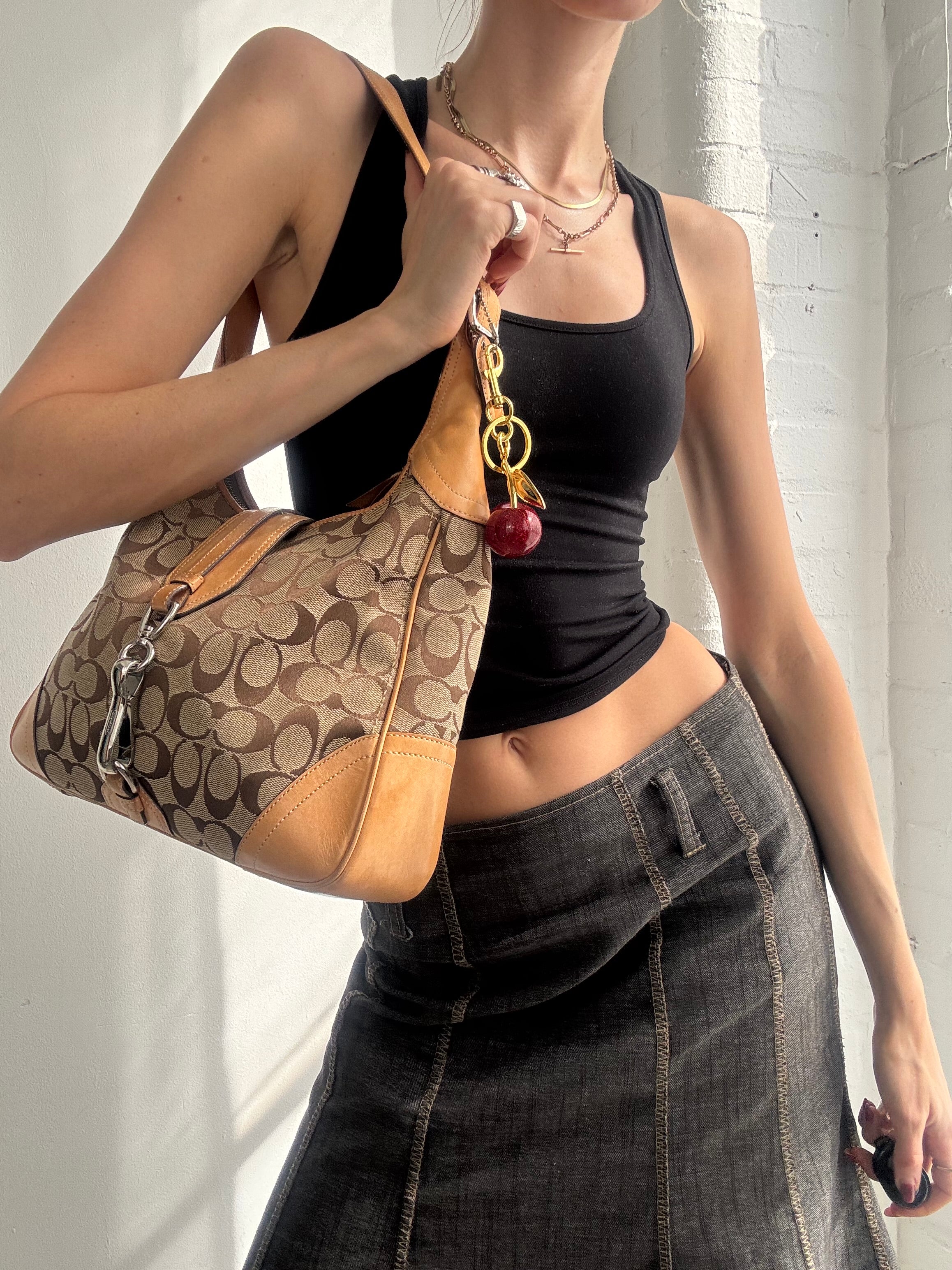 Vintage Y2K Coach monogram shoulder bag with charm
