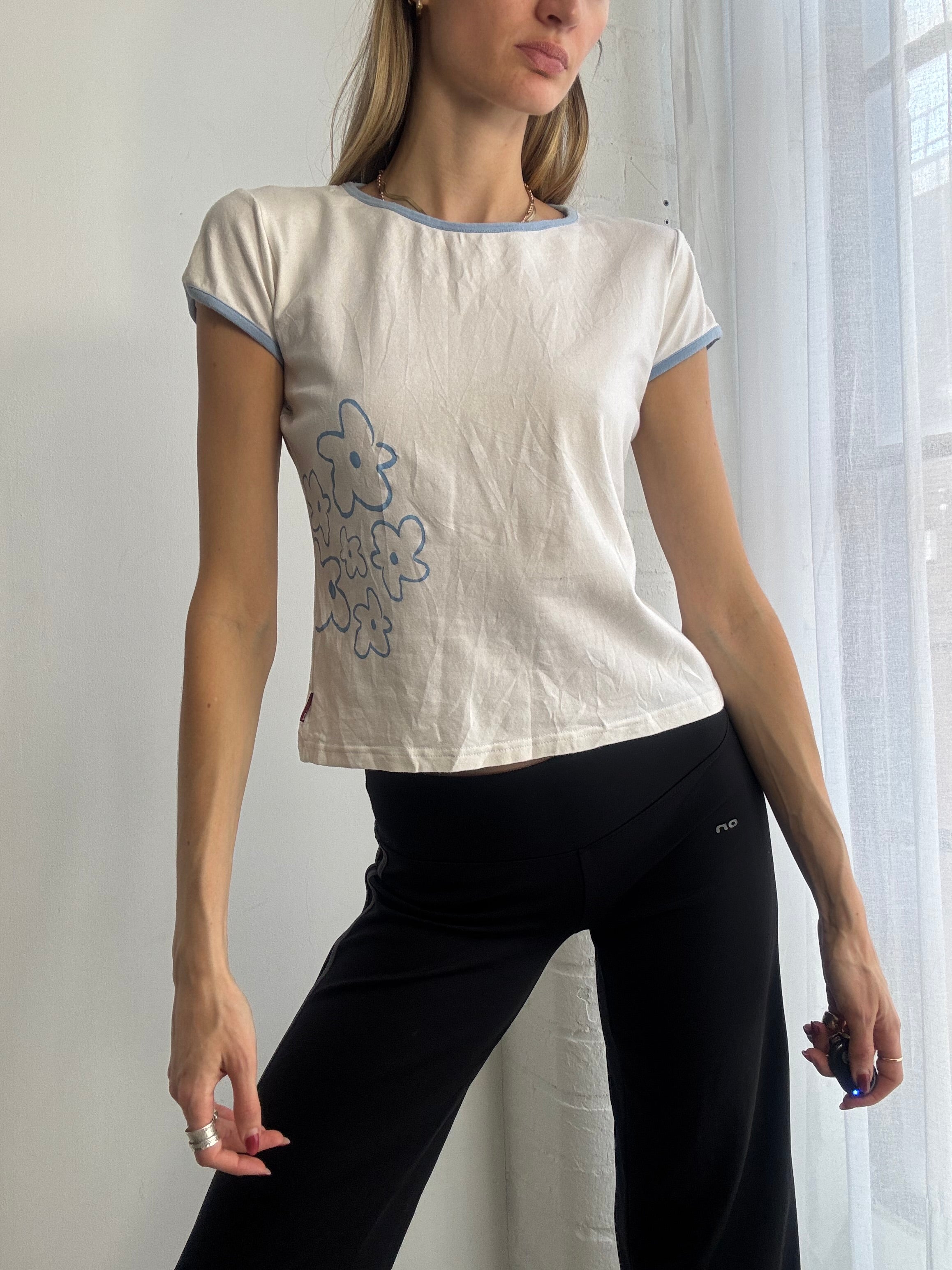 Vintage Y2K white baby tee with blue flower detail
