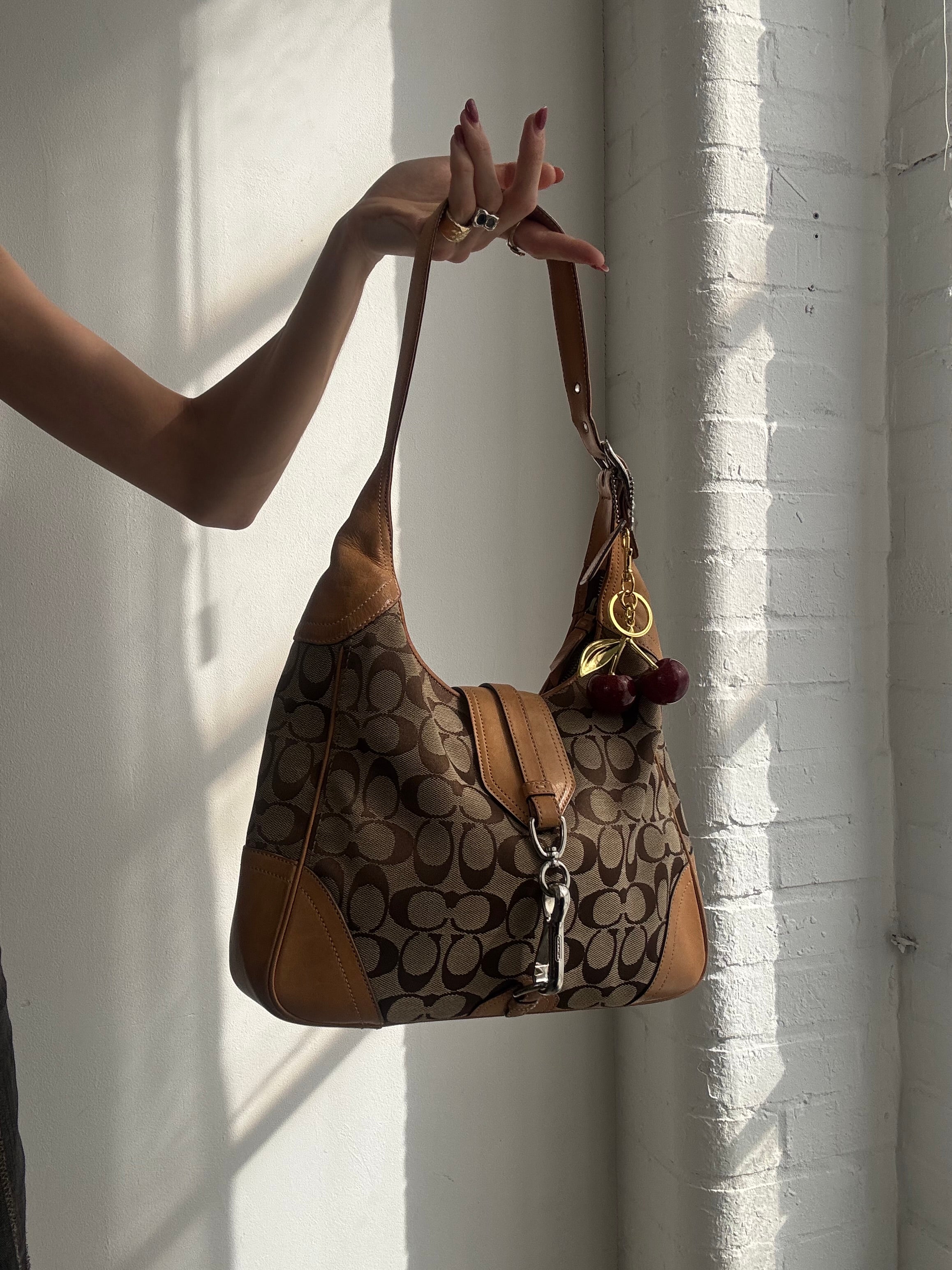 Vintage Y2K Coach monogram shoulder bag with charm