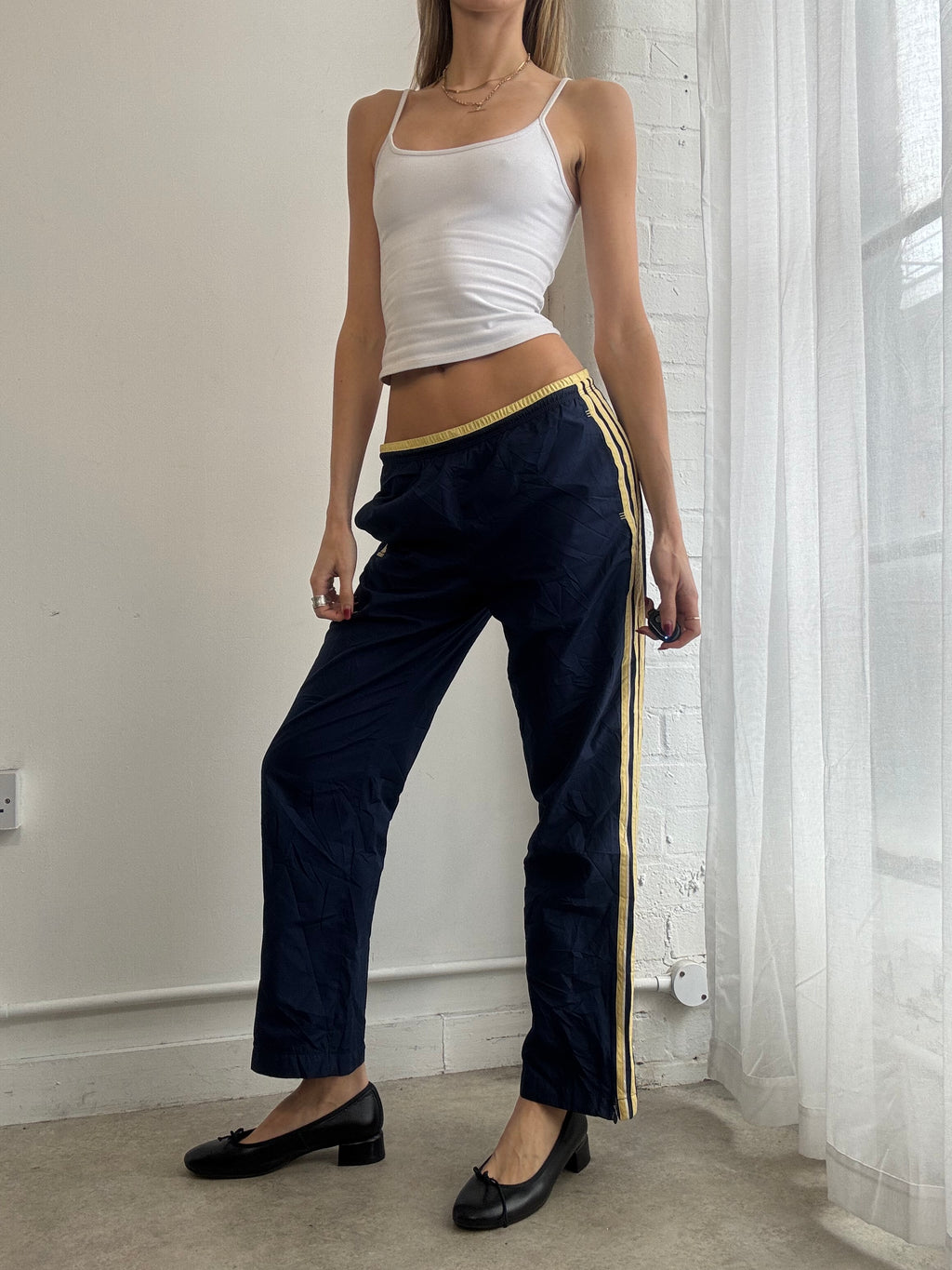 Vintage Y2K navy & yellow Adidas track trousers with side stripe