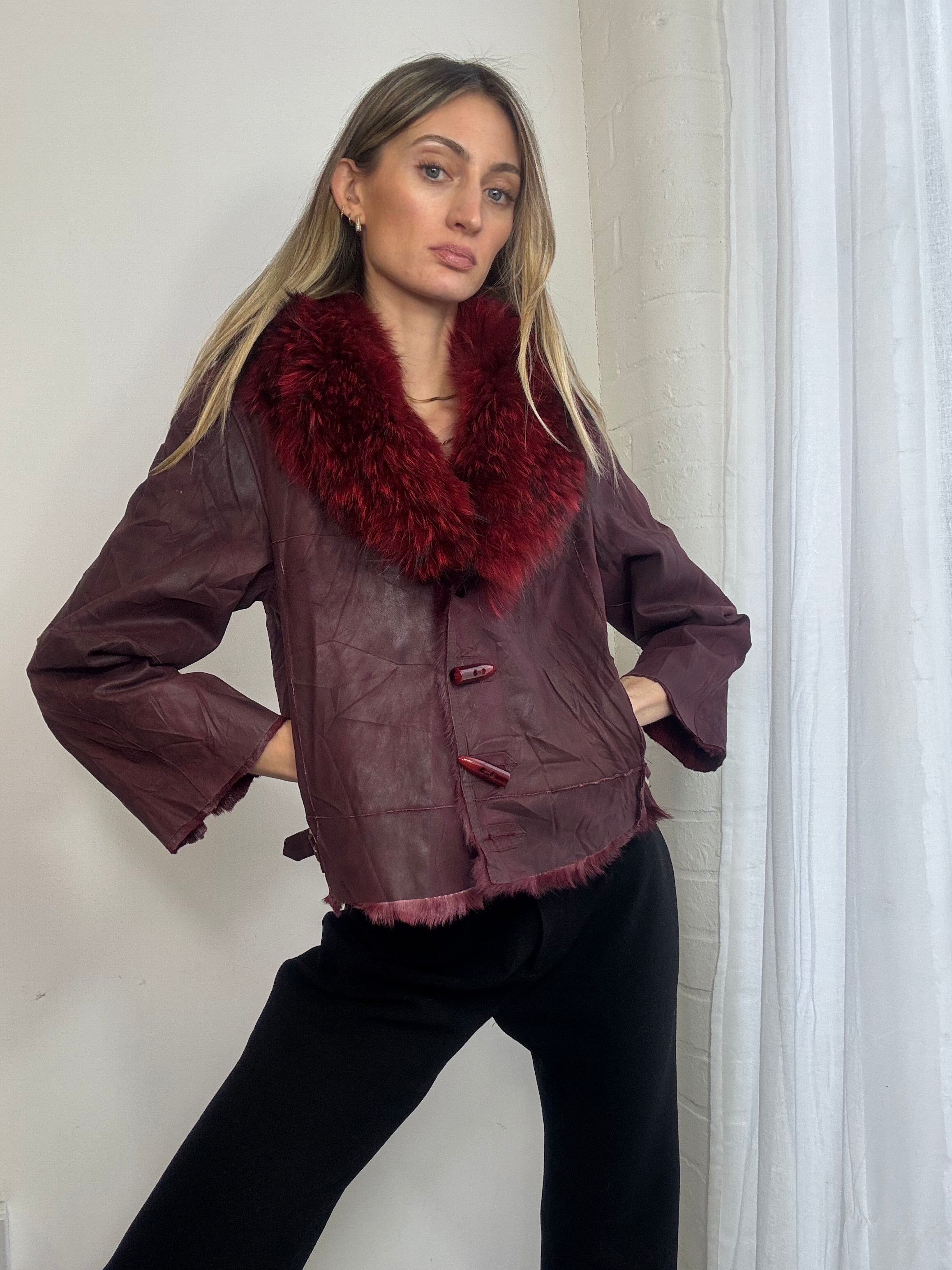 Vintage Y2K distressed red leather jacket with genuine fur trim