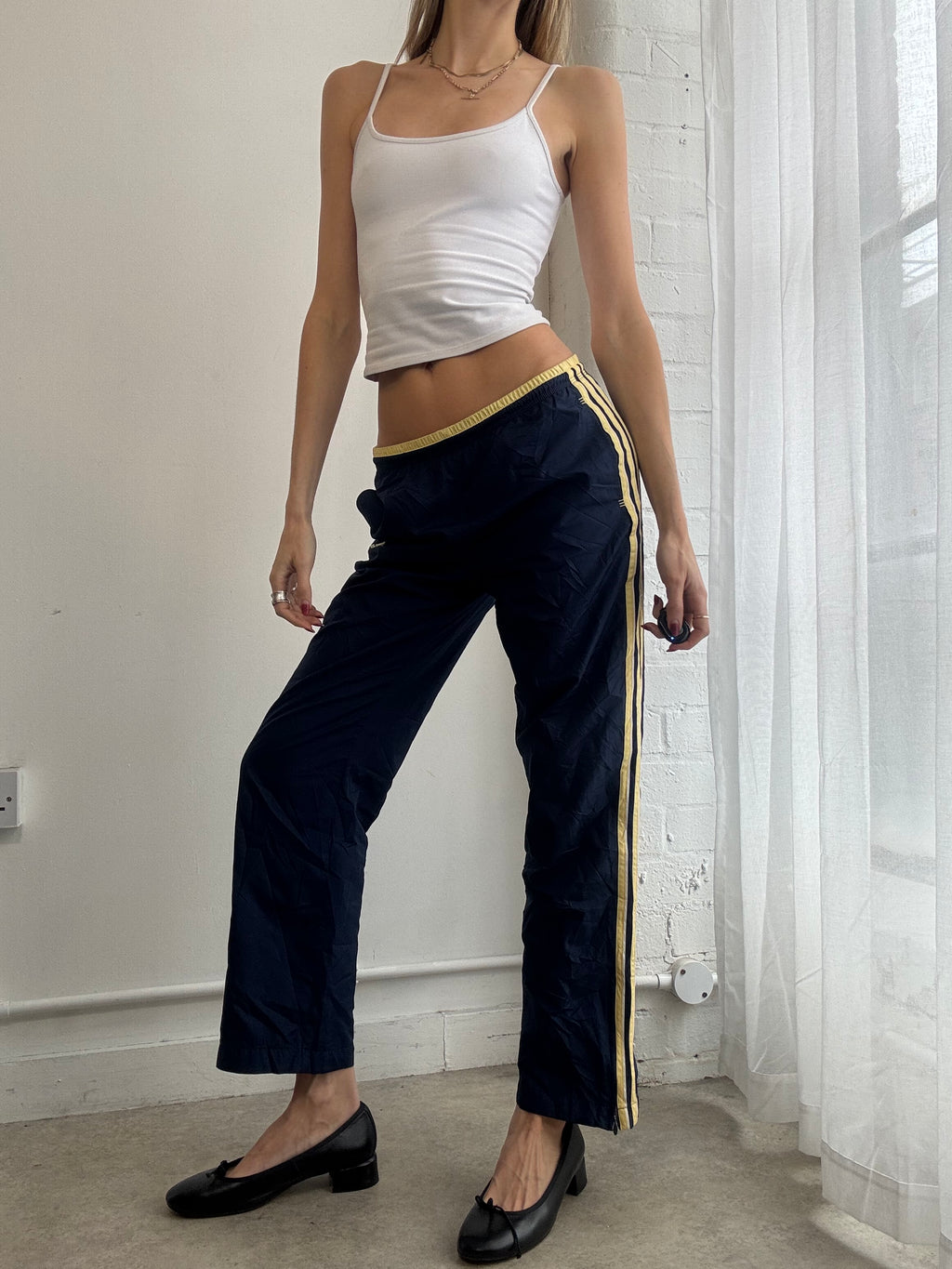 Vintage Y2K navy & yellow Adidas track trousers with side stripe