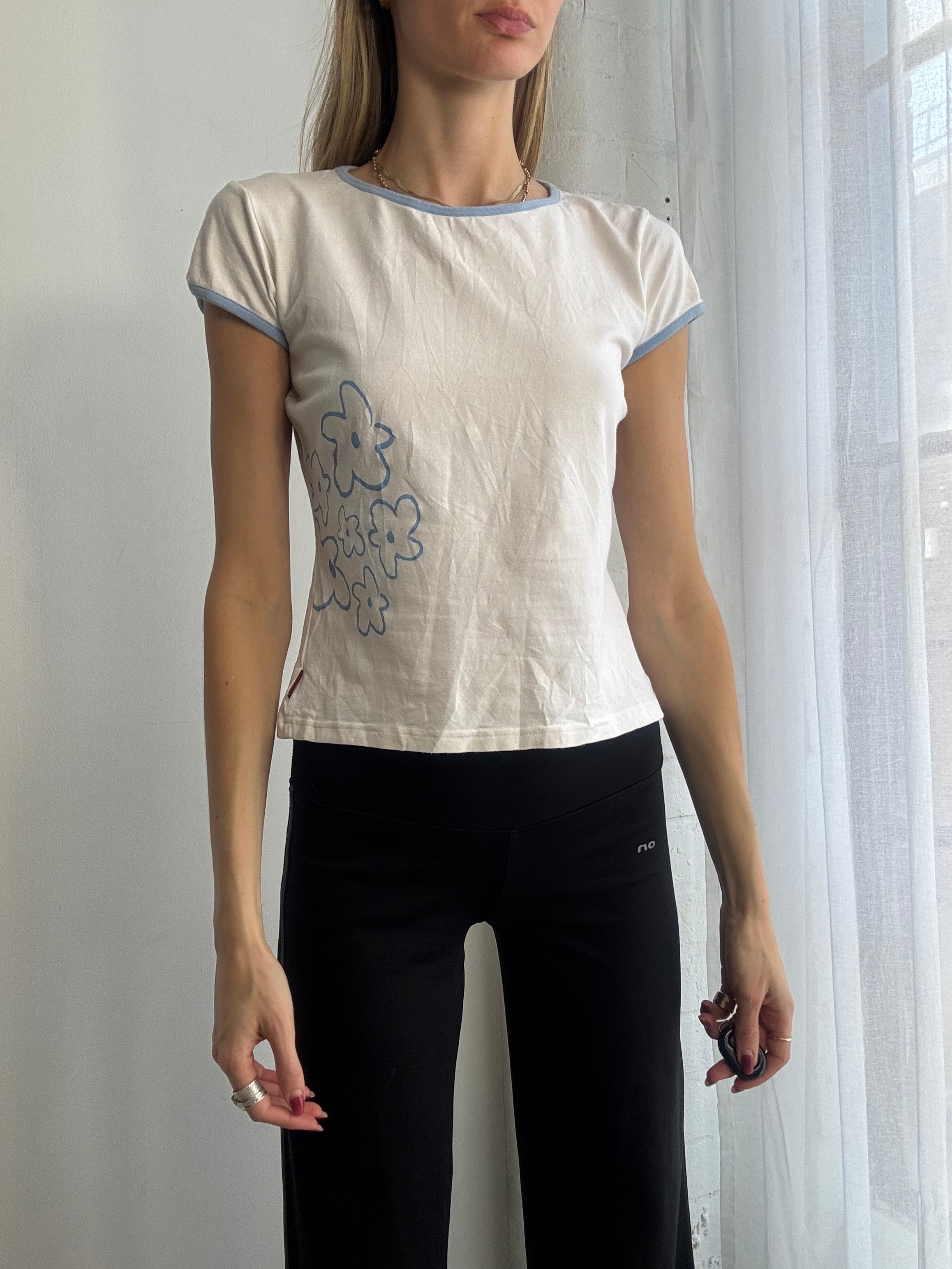 Vintage Y2K white baby tee with blue flower detail